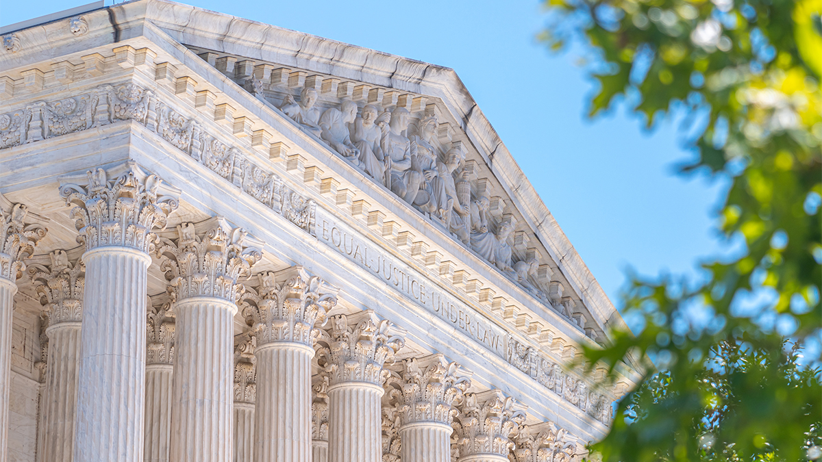 Green Tree in the foreground, representing Environmental Decision making at the U.S. Supreme Court Building in Washington DC